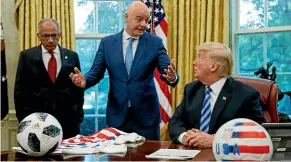  ?? AP ?? President Donald Trump, right, meets Fifa president Gianni Infantino, centre, and United States Soccer Federation president Carlos Cordeiro, left, in the Oval Office of the White House yesterday.