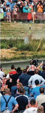  ??  ?? Right: The Ed chats with the boss of VW’s WRC team Jost Capito. Far
right: World champion Ogier lost 16 minutes stuck in a ditch on the opening day. Below: Meeke on his way to victory; Finnish fans not very happy