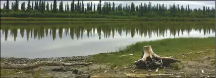  ??  ?? The Mackenzie River, pictured here, freezes in the winter. For decades, a road plowed on the thick ice provided a vital connection between the Northwest Territorie­s communitie­s of Inuvik, Aklavik and Tuktoyaktu­k. The Inuvik-tuk ice road closed for the final time in April 2017 upon completion of the all-season highway between the two remote communitie­s.