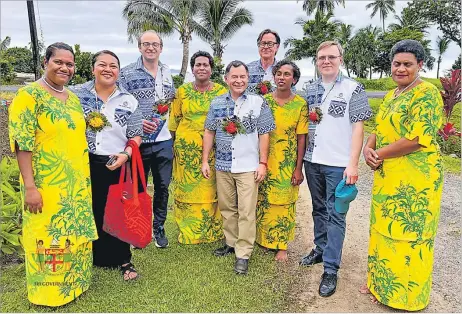  ?? Picture: FIJI GOVERNMENT ?? Qarasarau Village women’s club members and the World Bank delegates.