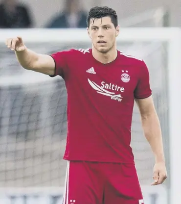  ??  ?? 0 Scott Mckenna will be watched by scouts tonight when Aberdeen face Burnley at Turf Moor.