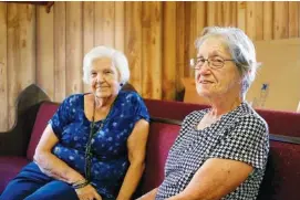  ?? STAFF PHOTOS BY WYATT MASSEY ?? Georgia Collier, right, and Wilma Paul, longtime members of Peakland Baptist Church in Decatur, Tenn., sit in the church Aug. 19.