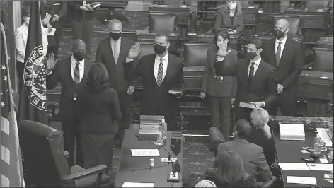  ?? SCREEN GRAB ?? IN THIS IMAGE FROM VIDEO, Vice President Kamala Harris swears in Sen. Raphael Warnock, D-Ga., Sen. Alex Padilla, D-Calif., and Sen. Jon Ossoff, D-Ga., on the floor of the Senate on Capitol Hill in Washington on Wednesday.