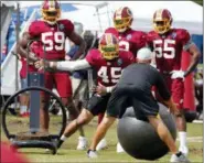  ?? STEVE HELBER — THE ASSOCIATED PRESS ?? Washington Redskins linebacker Pete Robertson (45) runs a drill during the morning session at NFL football training camp in Richmond, Va., Thursday, Aug. 2, 2018.