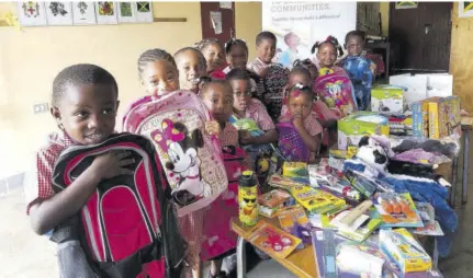  ??  ?? Children at a basic school in Westmorela­nd who were on the receiving end of new school supplies and learning manipulati­ves donated by travellers through the Sandals Foundation and Pack for a Purpose.