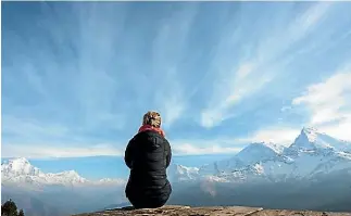  ?? PHOTOS: BROOK SABIN ?? A view of the Himalayas from Poon Hill.