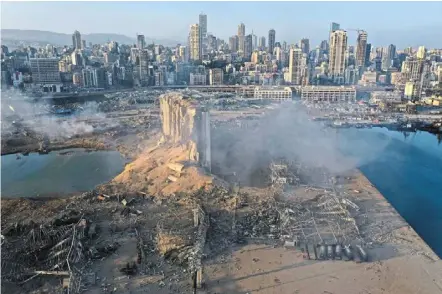  ?? — AP ?? Devastatin­g history: a drone picture of the destructio­n after the explosion at Beirut’s seaport.