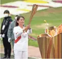  ?? HIRO KOMAE/AP ?? The last Olympic torch relay runner for the Osaka leg concludes the event in Suita, north of Osaka, western Japan, on Wednesday.