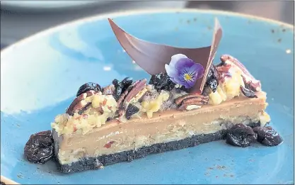  ?? WATERBAR ?? Waterbar pastry chef Erica Land’s decadent German chocolate cheesecake tastes as gorgeous as it looks.