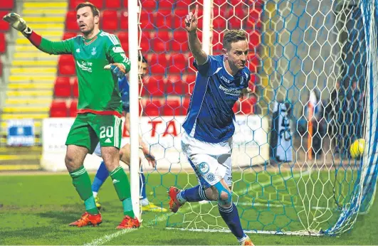 ?? Picture: SNS Group. ?? Steven MacLean wheels away after giving St Johnstone a 2-0 lead before half-time.
