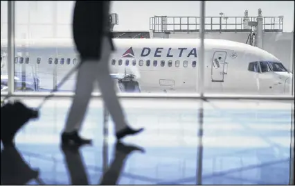  ?? DAVID GOLDMAN / AP ?? Delta’s $4.4 billion profit for 2016 will produce more than $1 billion in profit sharing for employees, Delta CEO Ed Bastian said. Payouts are scheduled for Feb. 14, Valentine’s Day.