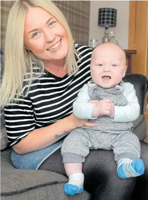  ??  ?? Natalie Whyte shows off a happy and healthy Callan after the allergy was cured