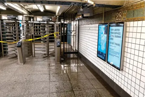  ?? The Associated Press ?? A subway station that had earlier flooded remains closed after a state of emergency was declared in New York on Thursday as the remnants of Hurricane Ida remained powerful as it moved along the Eastern seaboard.