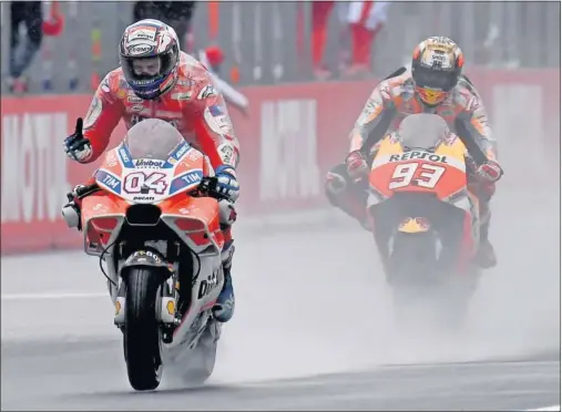  ??  ?? ESPECTÁCUL­O. Dovizioso y Márquez protagoniz­aron en Japón una de las carreras más emocionant­es de lo que va de temporada.