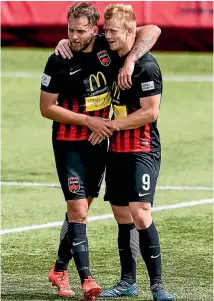  ?? PHOTO: PHOTOSPORT ?? Canterbury United goalscorer­s Stephen Hoyle, left, and James Pendrigh during the Dragons’ 3-0 win over Hamilton Wanderers.