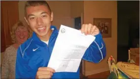  ?? PHOTO PROVIDED ?? Hunter Choy displays the Letter of Assurance he received, confirming his acceptance to West Point.