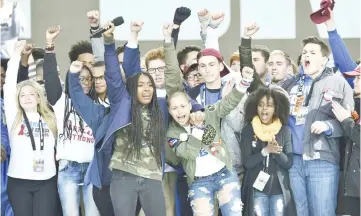  ?? AFP photo ?? Gonzalez (centre) gathers with other students on stage during the March for Our Lives Rally in Washington, DC. —