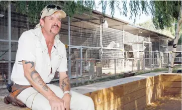  ?? AP FILE ?? “Tiger King” Joe Exotic — aka Joseph Maldonado-Passage — is shown in 2013 at the zoo he then operated in Wynnewood, Oklahoma.