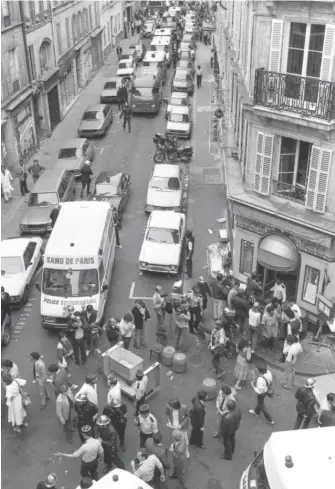  ?? AP FILE ?? The scene around Chez Jo Goldenberg in Paris on Aug. 9, 1982, after a terrorist attack left six dead — including Grace Cutler of Skokie — and 22 wounded.
