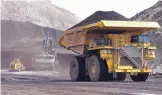  ?? MATTHEW BROWN/ASSOCIATED PRESS ?? A truck carrying 250 tons of coal hauls the fuel to the surface of the Spring Creek mine near Decker, Montana. The mine has been indefinite­ly shuttered by its new owners from the Navajo Nation in a dispute over whether it should be immune from some environmen­tal regulation­s.