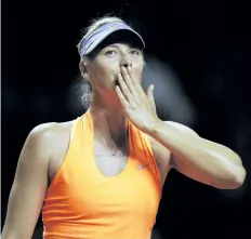  ?? ADAM PRETTY/BONGARTS/GETTY IMAGES ?? Maria Sharapova celebrates victory in her match Thursday against Erkaterina Makarova in Stuttgart, Germany.