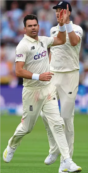  ?? PICTURE: GETTY ?? Jim and tonic: Anderson celebrates taking the wicket of Pujara