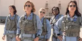  ?? PHOTOS BY APPLE ?? Jodi Balfour, left, Sonya Walger, Sarah Jones, Krys Marshall and Cass Bugge play astronaut trainees in “For All Mankind.”