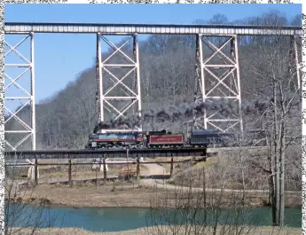  ?? David DeVault ?? No. 2839 passes a famous location in southweste­rn Virginia, Copper Creek viaduct on what was then the Clinchfiel­d Railroad, on its way to the filming of “Coal Miner’s Daughter.”