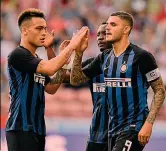  ??  ?? Dammi il cinque Lautaro Martinez e Maurito Icardi