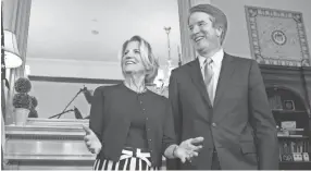  ??  ?? Supreme Court nominee Brett Kavanaugh stands with Sen. Shelley Moore Capito, R-W.V., before the start of their meeting on Thursday on Capitol Hill. CLIFF OWEN/AP