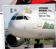  ??  ?? upside down: The inverted Vatican flag