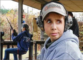  ?? CURTIS COMPTON / CCOMPTON@AJC.COM ?? Department of Natural Resources range safety officer Chip Madren, 20, works at the Clybel Shooting Range at the Charlie Elliott Wildlife Center on Tuesday in Mansfield. Seven years ago, Madren was given two years to live after being diagnosed with...