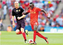  ??  ?? New recruit: Sadio Mané, one of Liverpool’s summer signings, is expected to make his debut against Arsenal today