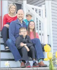  ?? ANDREW WATERMAN/THE TELEGRAM ?? Geoff Eaton and family. Karen (top), Geoff, Mira (middle), Kane and Adia(bottom).