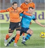  ??  ?? Peter Pawlett in action against Forfar’s Graeme Holmes