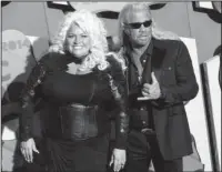  ?? The Associated Press ?? ON THE HUNT: In this June 4, 2014, file photo, Beth Chapman, left, and Duane Chapman arrive at the CMT Music Awards at Bridgeston­e Arena in Nashville, Tenn.