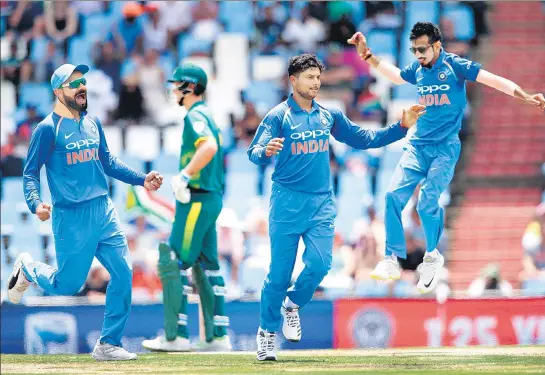  ?? AFP ?? Yuzvendra Chahal and Kuldeep Yadav for the second match justified Virat Kohli’s decision to play two spinners in South Africa. The two shared eight wickets to script India’s biggest ODI win over South Africa.