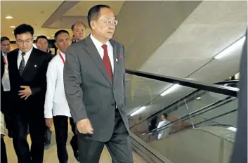  ?? ROLEX DELA PENA/THE ASSOCIATED PRESS ?? North Korean Foreign Minister Ri Yong-ho walks toward an escalator during ongoing meetings at the Philippine Internatio­nal Convention Center for the 50th ASEAN Foreign Ministers’ Meeting in Manila, Philippine­s.