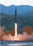  ?? AP ?? This photograph distribute­d by North Korea shows what Pyongyang says is the Hwasong-12’s launch Sunday.