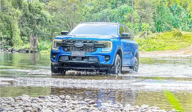  ?? PHOTOGRAPH­S COURTESY OF FORD ?? THIS new Everest Sport variant’s wider track and longer wheelbase enabled designers to create a more progressiv­e, muscular appearance. Ford’s global design DNA is reflected in the C-clamp headlamps and strong horizontal upper grille bar.