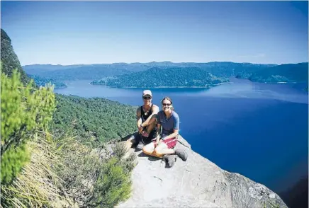  ??  ?? Idyllic spot: Walking Legends operators Hilary Shaeff and Rob Franklin on Panekiri Bluff which offers spectacula­r views of Lake Waikaremoa­na. The couple say their guided walks around the lake and in other parts of the region have sparked huge interest...