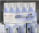  ?? ?? Packages of insulin sit in a refrigerat­or at the Kaiser Permanente central refill pharmacy in Downey. The state and nonprofit Civica have agreed to a 10-year partnershi­p to have the costs lowered by about 90%.