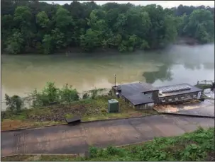  ?? Submitted photo ?? MUDDY WATERS: Turbid water collects near the intake of the Ouachita Plant on upper Lake Hamilton after heavy rains. New chemicals added to the treatment process makes it easier for the city to treat the turbid water.