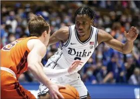  ?? BEN MCKEOWN - THE ASSOCIATED PRESS ?? Duke’s Jeremy Roach, right, guards Virginia Tech’s Storm Murphy during the second half of an NCAA college basketball game in Durham, N.C., Wednesday, Dec. 22, 2021.