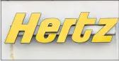  ?? STEVEN SENNE — THE ASSOCIATED PRESS FILE ?? Car rental company Hertz is ordering 100,000 electric vehicles from Tesla. The company says it’s buying the Tesla Model 3s by the end of 2022, and it also will buy electric vehicle chargers.