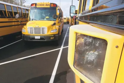  ?? ROB OSTERMAIER/STAFF ?? Newport News is considerin­g installing cameras on their school bus fleet to deter drivers from passing the vehicle when it is stopped to pick up and drop off students. A pilot program with cameras on three buses caught over 700 vehicles violating the law and buses with their red lights flashing.