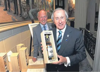  ??  ?? Sir Jackie Stewart was there when the first five bottles were auctioned at the RAC Club in London.