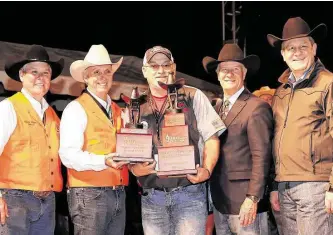  ?? Tim Warner / Contributo­r ?? Operation BBQ Relief won the Grand Champion Overall trophy at the 2019 World’s Championsh­ip Bar-B-Que Contest.