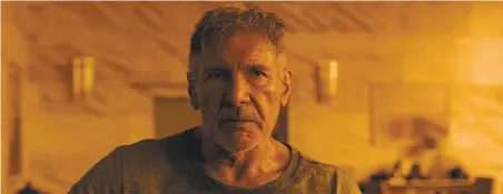  ?? Warner Bros. photos ?? Harrison Ford reprises his role as Rick Deckard in “Blade Runner 2049,” a sequel to the 1982 original.