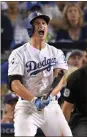  ?? Mark J. Terrill / AP ?? Los Angeles’ Corey Seager celebrates after a two-run home run against the Houston Astros.